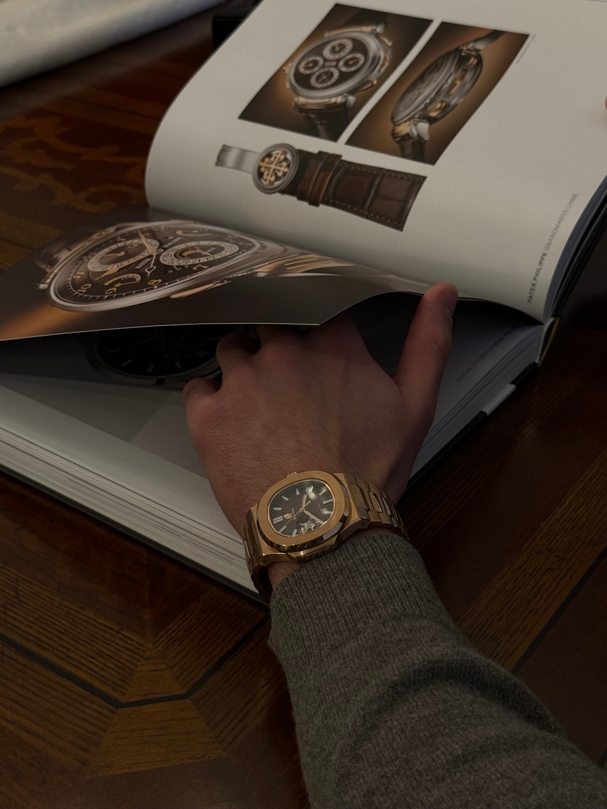 Pater Filus watch resting on a printed catalogue